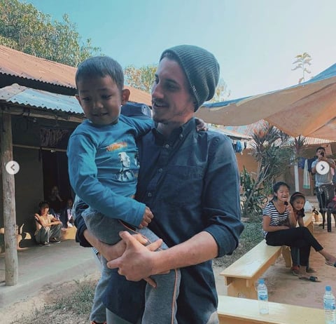 ywam-tyler-missionary-outreach-india-johnny-holding-kid