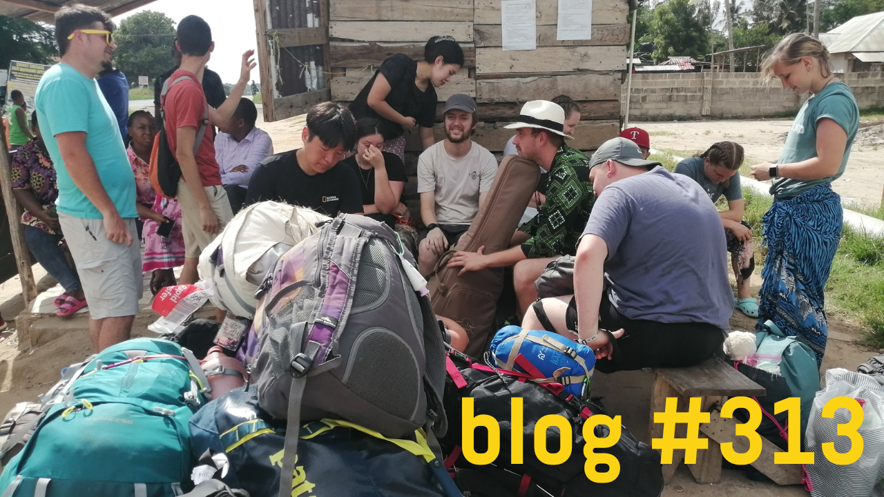 students on outreach and lots of baggage