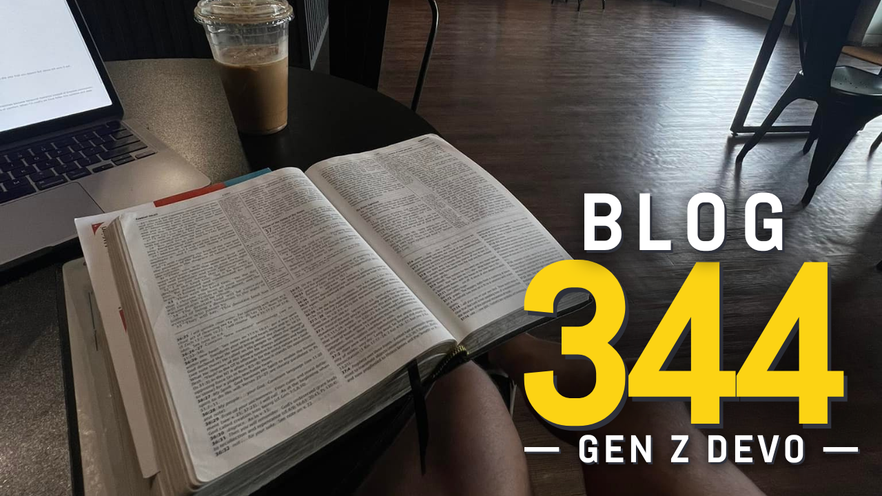 bible on lap of person sitting in coffee shop looking at wall far away